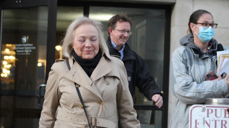 Karen Celestino-Horseman (left), Jennifer Teising (right), and reporter Dave Bangert (back) leaving court during Teising’s bench trial. - FILE PHOTO: WFYI News/Ben Thorp