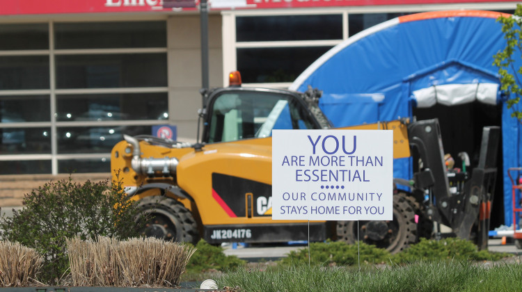 Outside of Indiana University Health's Methodist Hospital, a sign reads, "You are more than essential. Our community stays home for you." - Lauren Chapman/IPB News