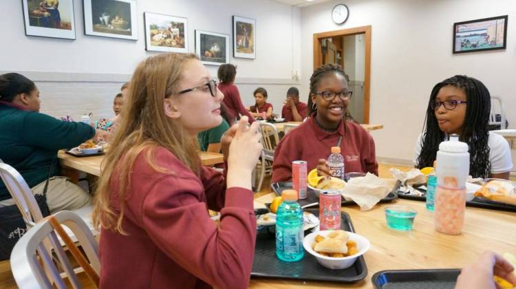 Students eat lunch at the Oaks Academy Middle School, a private Christian school that is integrated by design.  - Photo by Dylan Peers McCoy