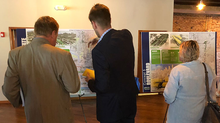 Community members view INDOT displays at the open house Wednesday night. - Sarah Panfil/WFYI