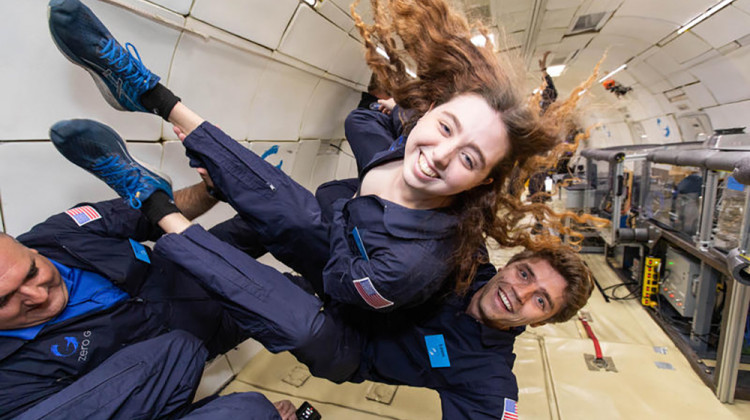 Purdue researchers Paige Beck and Leon Brendel testing their fridge system in zero gravity. - Stephen Boxall/ZERO-G www.gozerog.com