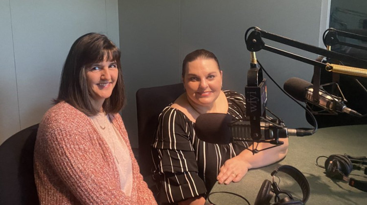 Roberta Kuonen and Kim Trimpe with the Paws & Think Youth-Canine Program at Warren Central High School - WFYI's Taylor Bennett