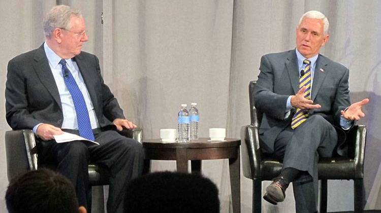 Gov. Mike Pence answers a question during the Forbes Reinventing America summit in Indianapolis Thursday. - TheStatehouseFile.com