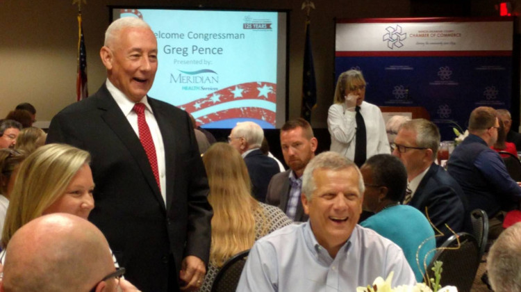U.S. Rep. Greg Pence (R-6th District), standing, talks with constituents at a Chamber of Commerce lunch in Muncie in August 2019. - Stephanie Wiechmann