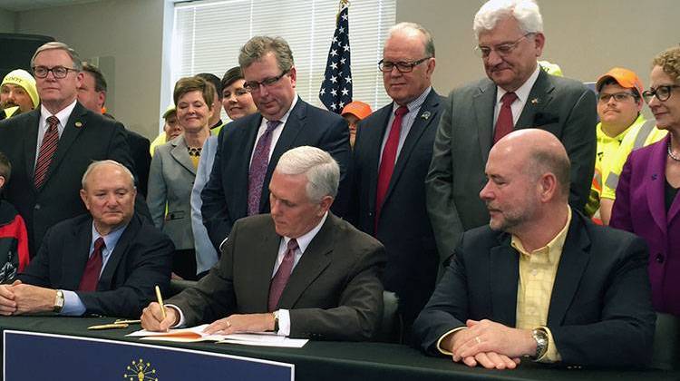 Governor Signs Two Road Funding Bills Into Law