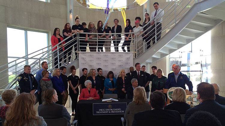 Indiana Gov. Mike Pence signed some of the bills confronting drug abuse and addiction at Hope Academy, a drug recovery high school in Indianapolis. - Drew Daudelin