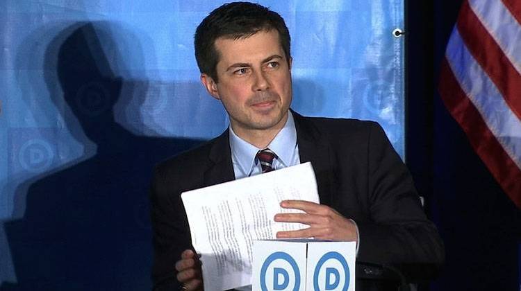 In a Saturday, Feb. 25, 2017 photo, South Bend Mayor Pete Buttigieg addresses the Democratic National Committee Winter Meeting in Atlanta. A spokesman for Buttigieg says . A report in Politico says Buttigieg met with former President Barack Obama in D.C., to discuss a potential 2020 bid for the White House. - AP Photo/Alex Sanz