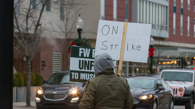 Fort Wayne Philharmonic Players Association musicians picket outside of the embassy on January 6, 2023. Musicians have been on strike since early December 2022, when an agreement for a new contract could not be reached. - Brittany Smith / WBOI