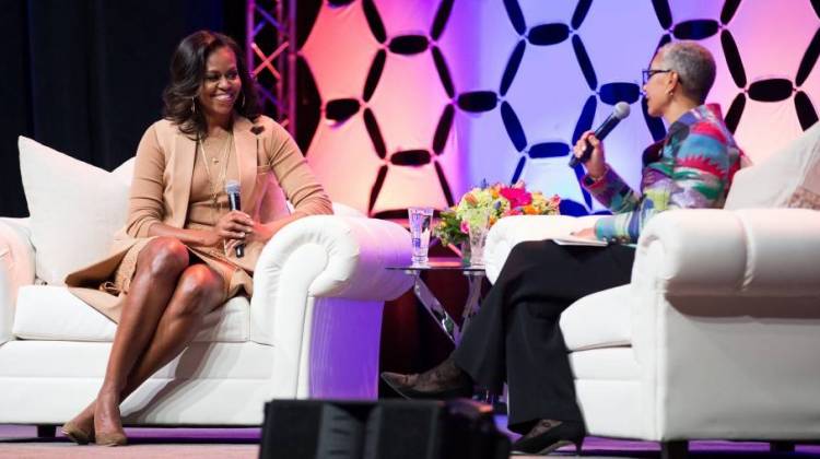 Former first lady Michelle Obama (left) speaks with moderator Alecia DeCoudreaux (right). - Photo by Daniel Arthur Jacobson/Courtesy of Central Indiana Community Foundation