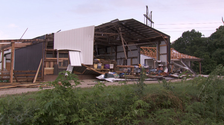 Like her home, Sue Stolz's barn was severely damaged in the tornado. - Seth Tackett/WTIU
