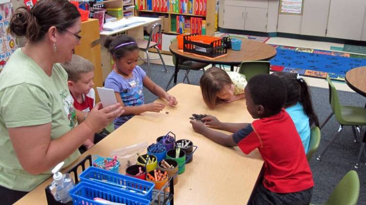 In this file photo, students at a pre-kindergarten camp in Avon, Indiana, play a counting game. - Elle Moxley/StateImpact Indiana/File
