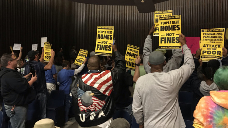 Dozens showed up to protest the ordinance. Social activist Tony Davis says it dehumanizes people experiencing homelessness. - Drew Daudelin/WFYI