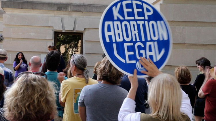 A crowd gathered Monday to protest Indiana's abortion ban. The protests were organized by Hoosier Jews for Choice, Indiana NOW, and MADVoters.  - Devan Ridgway, WTIU News