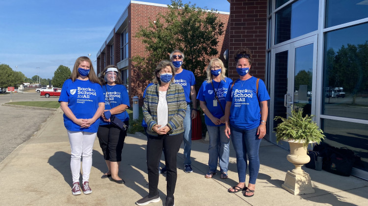 Randi Weingarten, president of the American Federation of Teachers, stands with Anderson Community Schools teachers outside the district high school on Friday, Aug. 13, 2021 in Anderson. - Elizabeth Gabriel/WFYI