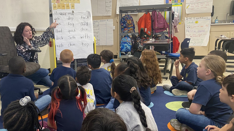 Teacher Ivy Sullivan works on reading skills with kindergarten students at Adelante charter school on Thursday, April 27, 2023 in Indianapolis. - Elizabeth Gabriel / WFYI