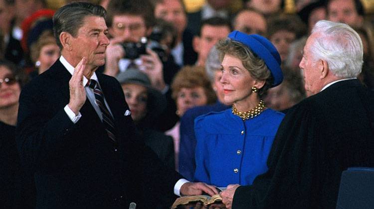 In this Jan. 21, 1985 file photo, first Lady Nancy Reagan watches as President Ronald Reagan is sworn in during ceremonies in the Rotunda beneath the Capitol Dome in Washington.  - AP Photo/Ron Edmonds, File