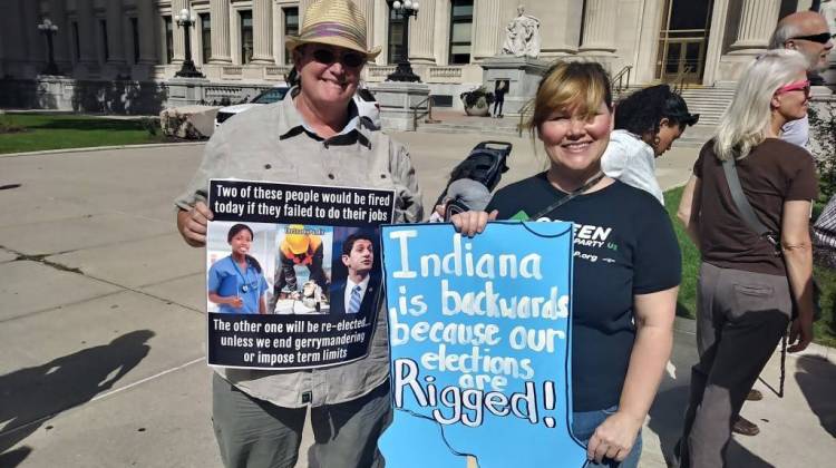 Protesters show off their signs during an October 2017 protest at the federal courthouse. - FILE PHOTO: Lauren Chapman/IPB News