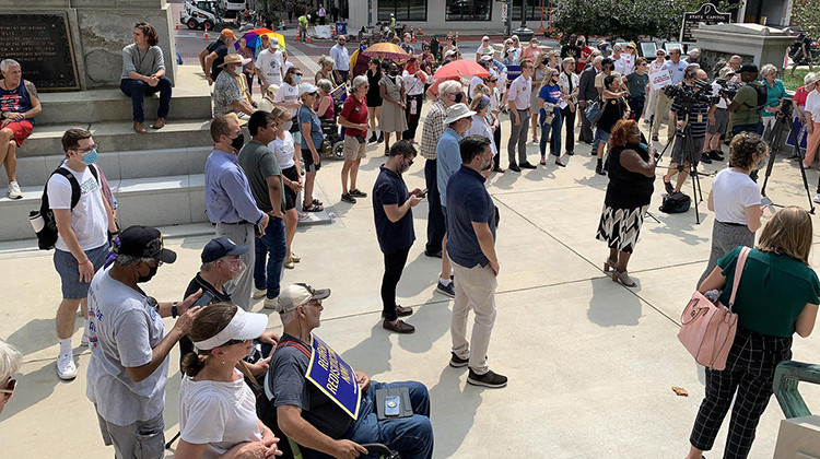 Redistricting reform advocates rallied outside the Statehouse ahead of a legislative hearing. - Brandon Smith/IPB News