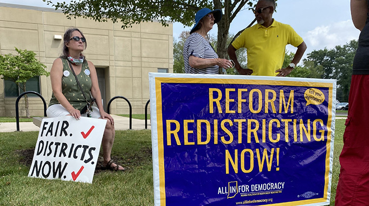 Members of the Elkhart County Democratic Party demonstrate before state lawmakers' public hearing on redistricting on Saturday, Aug. 7. - Gemma DiCarlo/WVPE