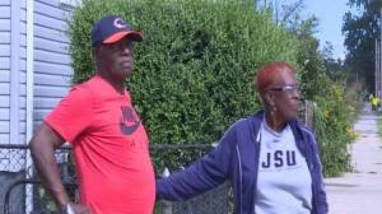 Byron Florence stands outside of his East Chicago home where soil testing has confirmed lead. He blames his poor health on the lead contamination soil. - WFIU-FM