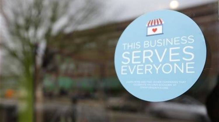 Stickers such as this one began appearing at businesses around Indianapolis in the wake of debate over Indiana's RFRA legislation. - Associated Press file photo