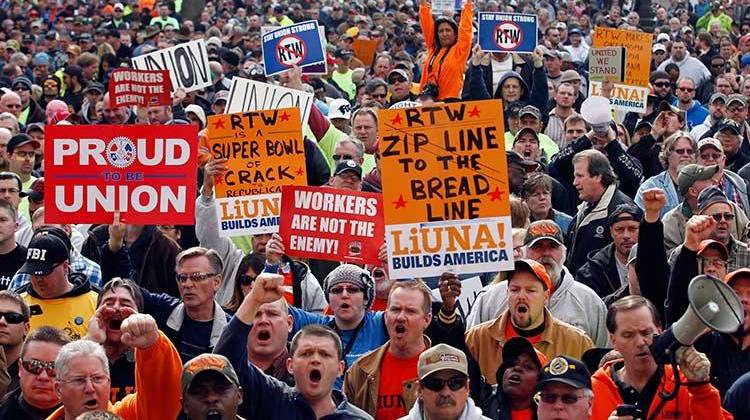 Union protestors gathered outside the Statehouse after the Senate voted to pass the right-to-work bill on Feb. 1, 2012.  -  AP Photo/Michael Conroy