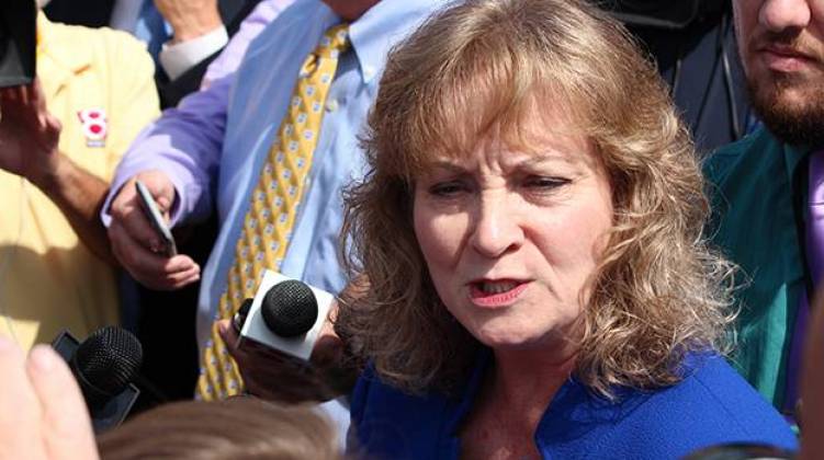 State superintendent Glenda Ritz talks to reporters after announcing her candidacy for governor of Indiana. - Rachel Morello/StateImpact Indiana