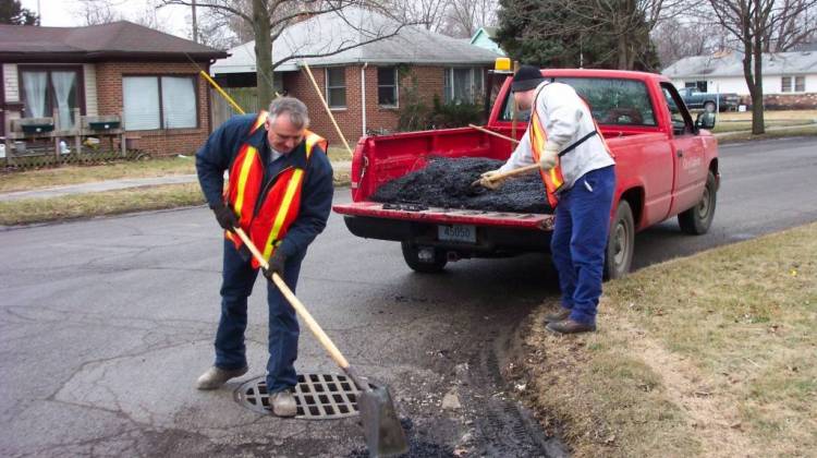 The Lafayette Street Department fills a pothole. - City of Lafayette