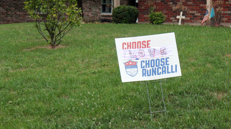 A sign from a house close to Roncalli High School protests the treatment of a guidance counselor. Shelly Fitzgerald's job has been threatened by the school over her marriage to a woman. - Lauren Chapman/IPB News