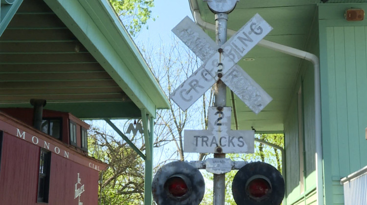 Photo caption: A railroad crossing sign from the old Monon Railroad line at The Depot Railroad Museum in Salem. The trail will takeover part of the now closed railroad line.  - Kirsten Adair/IPB News