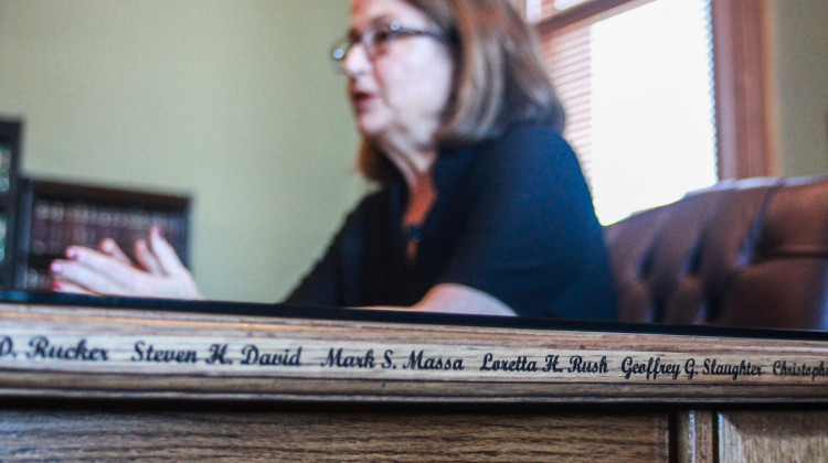 Chief justice celebrates 'historic' new Supreme Court conference table, built by prison inmates