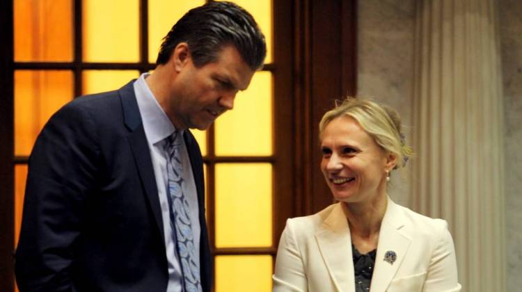 Sen. Ryan Mishler (R-Bremen)  chats with Sen. Victoria Spartz (R-Noblesville) in the chamber. - Lauren Chapman/IPB News