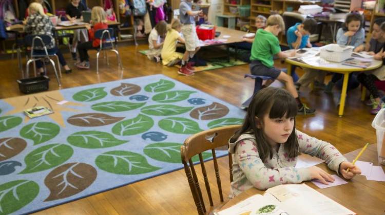 First graders work on coursework at IPS School 84, one of the Center for Inquiry campuses, Indianapolis, Wednesday, May 18, 2016. Ethnically, the Center for Inquiry School 84 is one of the least diverse in the IPS system, and enrollment priority is given to kids living near its Meridian-Kessler location. - Photo by Robert Scheer/IndyStar