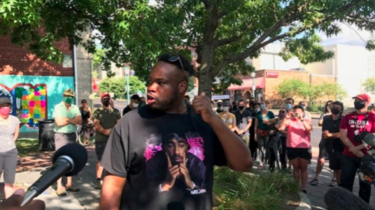 Vauhxx Booker speaks during a rally in downtown Bloomington after his alleged attack last July. - (Adam Pinsker, WFIU/WTIU News)