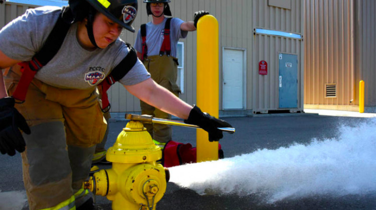 Career and technical education students train in a program through school to become firefighters. - (Justin Hicks/IPB News)