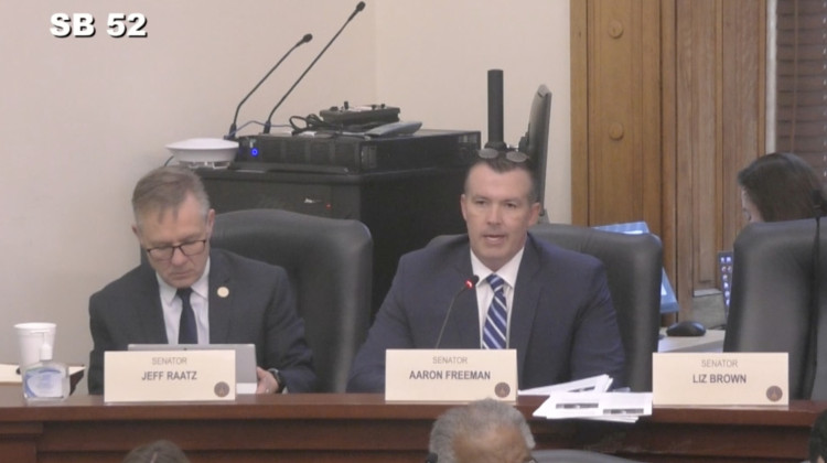 Senator Aaron Freeman (R-Indianapolis) discusses his bill blocking dedicated lanes for public transportation - Photo taken from a stream of the meeting