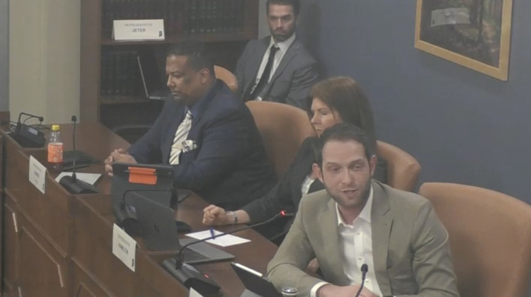 Representative Blake Johnson (D-Indianapolis, right) broke into tears as he urged fellow lawmakers to oppose SB52. - Photo from House committee live stream