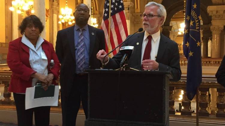 (From L to R) Sen. Jean Breaux (D-Indianapolis) and Sen. Greg Taylor (D-Indianapolis) look on as Sen. Tim Lanane (D-Anderson) discusses his caucus' agenda for the 2017 session. - Brandon Smith/IPB