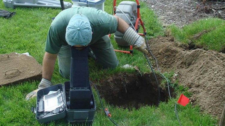 A septic tank inspection in progress. - U.S. Environmental Protection Agency
