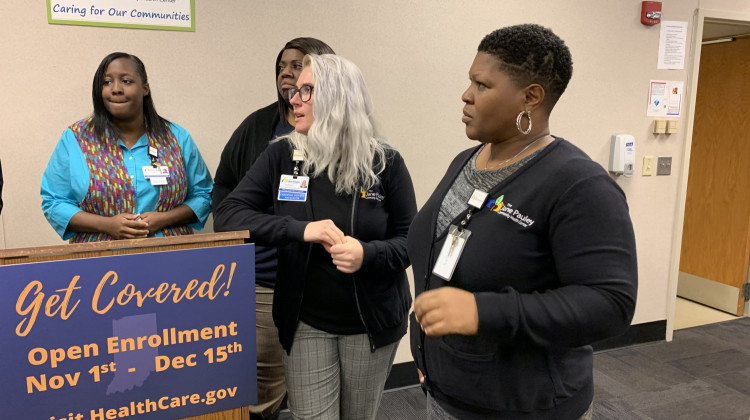 Employees from the Jane Pauley Community Health Center at an open enrollment visit. - Jill Sheridan/IPB News