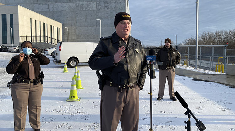 Sheriff Kerry Forestal (center) and Deputy Chief Tanesha Crear (left) with the Marion County Sheriff's Office discuss the process of moving detainees to the new Community Justice Campus on Saturday, Jan. 15, 2022. - (Elizabeth Gabriel/WFYI)
