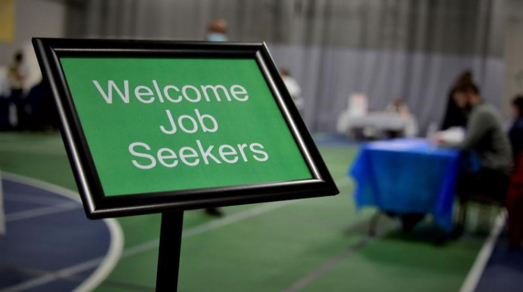 A sign at a job fair welcomes job seekers. According to December unemployment numbers, there are less people without jobs actively looking for one. - (Justin Hicks/IPB News)