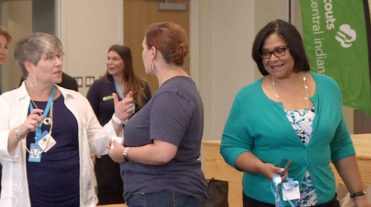 Attendees gather for the round table discussion on the State of Girls in Indiana.  - Jill Sheridan/IPB News