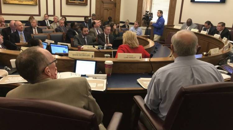 Members of the State Budget Committee listen as fiscal analysts present the new state revenue forecast. - Brandon Smith/IPB