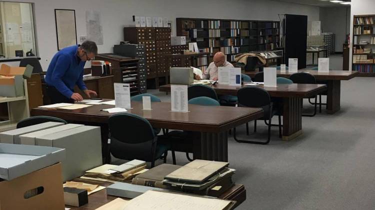 Researchers and volunteers look through material in the reading room at the Indiana State Archives. - Indiana State Archives and Records Administration