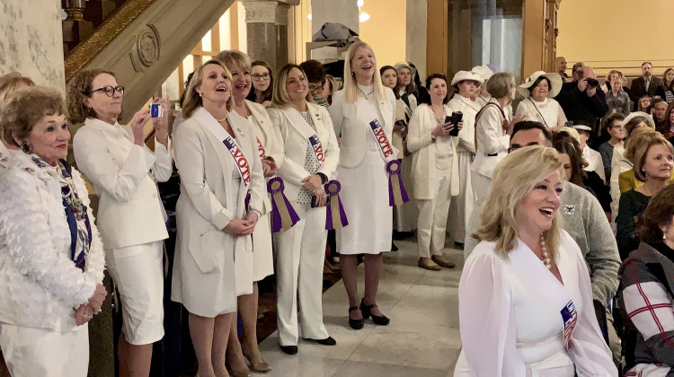 Members of the Indiana General Assembly celebrate the women's suffrage centennial at the Statehouse.  - Brandon Smith/IPB News