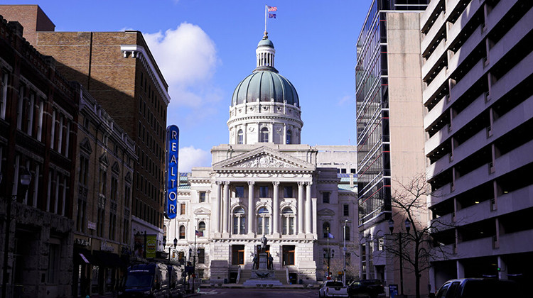 FILE - This Jan. 15, 2021, file photo, shows the Indiana Statehouse in Indianapolis. A federal judge ruled Tuesday, Aug. 10, 2021, that several of Indiana’s laws restricting abortion are unconstitutional, including the state’s ban on telemedicine consultations between doctors and women seeking abortions. - AP Photo/Michael Conroy, File