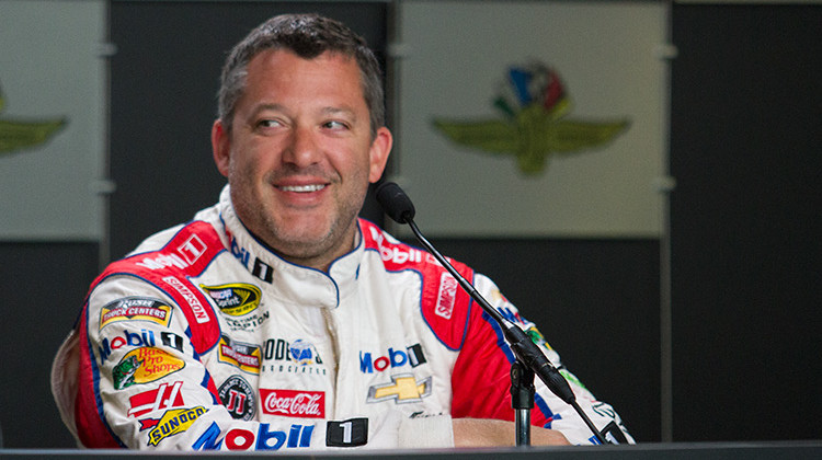 FILE: Tony Stewart speaks to the media before a practice session leading up the the 2016 Brickyard 400 at the Indianapolis Motor Speedway. Stewart  headlined the six new nominees eligible for induction into the NASCAR Hall of Fame. - Doug Jaggers/WFYI, File
