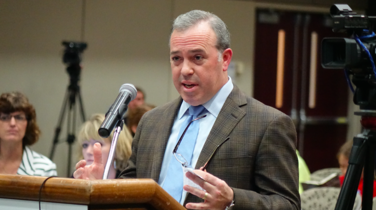 Stuart Udell, the CEO of K12 Inc., the countryâ€™s largest operator of for-profit charter schools, answers questions from members of the Indiana Board of Education during a hearing about the failing Hoosier Academies Virtual School on May 10, 2017 at the University of Evansville. - Eric Weddle/WFYI Public Media