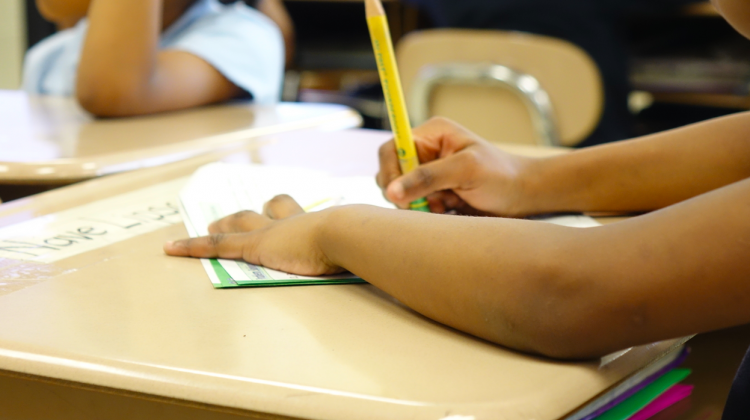 A student fills out a worksheet.  - WFYI News, file